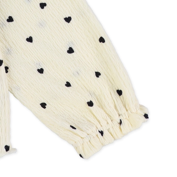 ハート柄シャーリングフレア長袖トップス