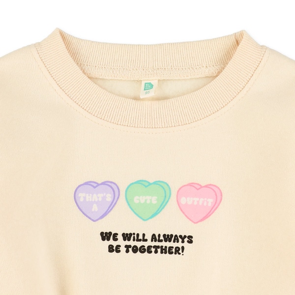 裏起毛胸ハートロゴトレーナー