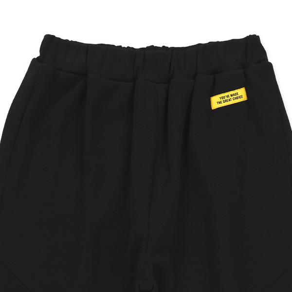 裏起毛ひざ切り替えロゴパンツ